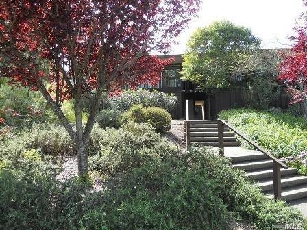 a house view with a outdoor space