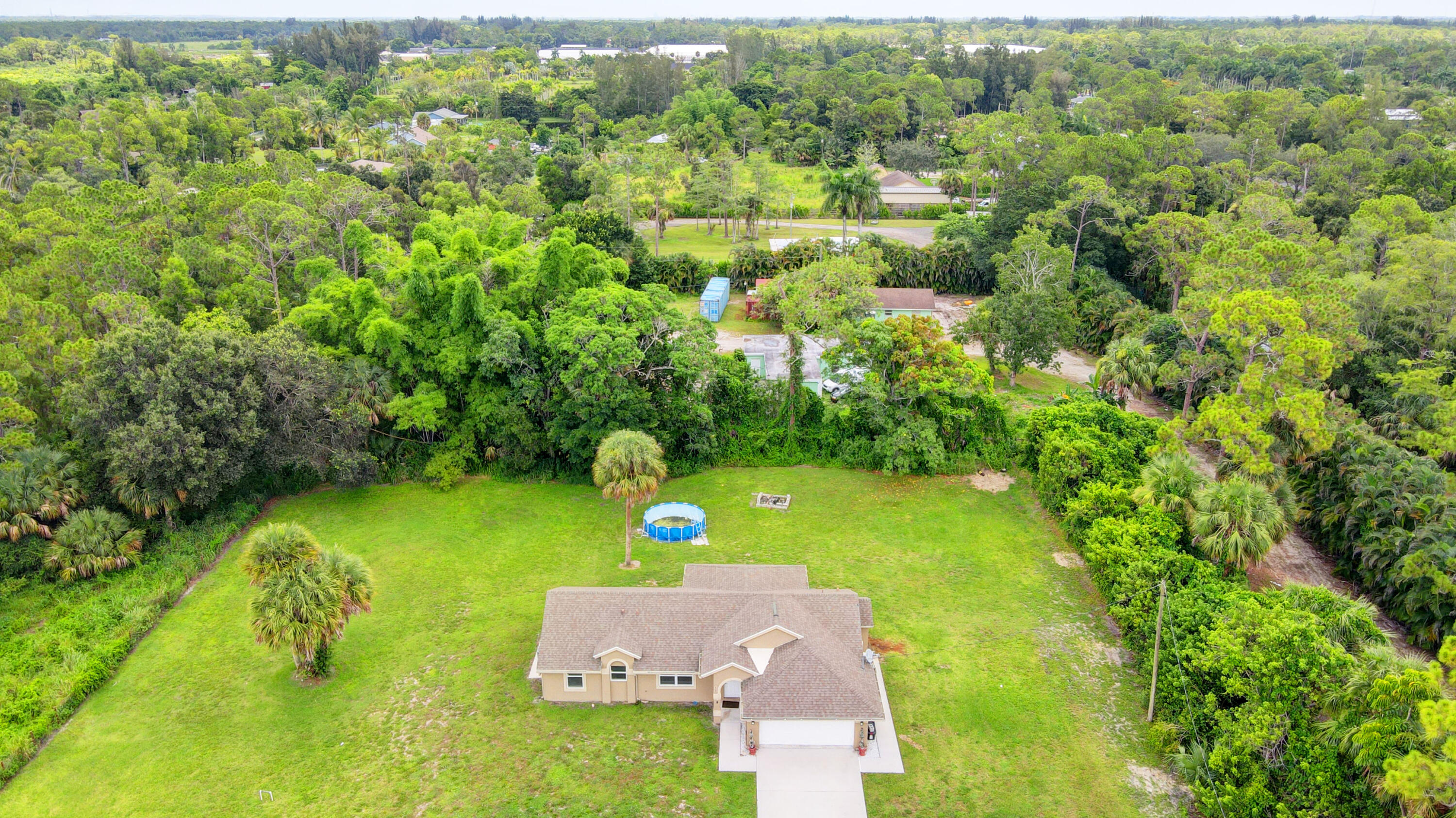 2380 C Road Loxahatchee Groves, FL 33470 - Photo 32 of 43 32_house air (3)