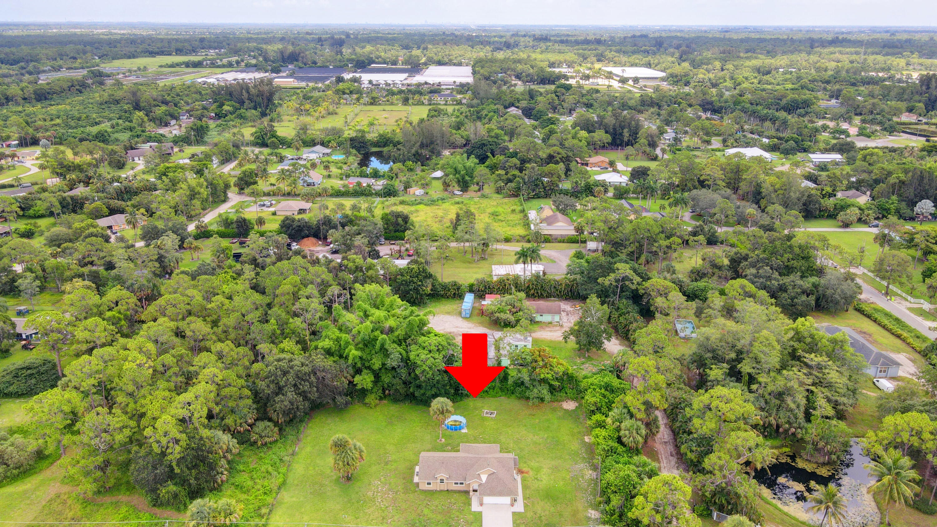 2380 C Road Loxahatchee Groves, FL 33470 - Photo 33 of 43 33_house air (4)
