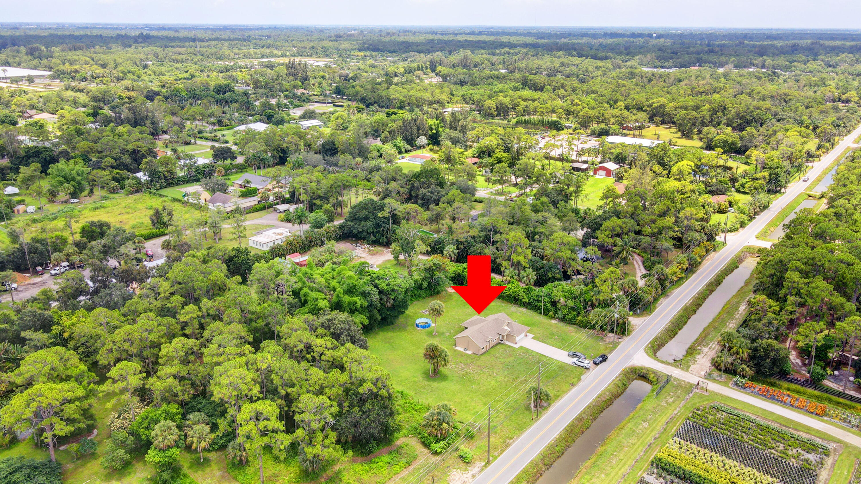 2380 C Road Loxahatchee Groves, FL 33470 - Photo 38 of 43 38_house air (9)