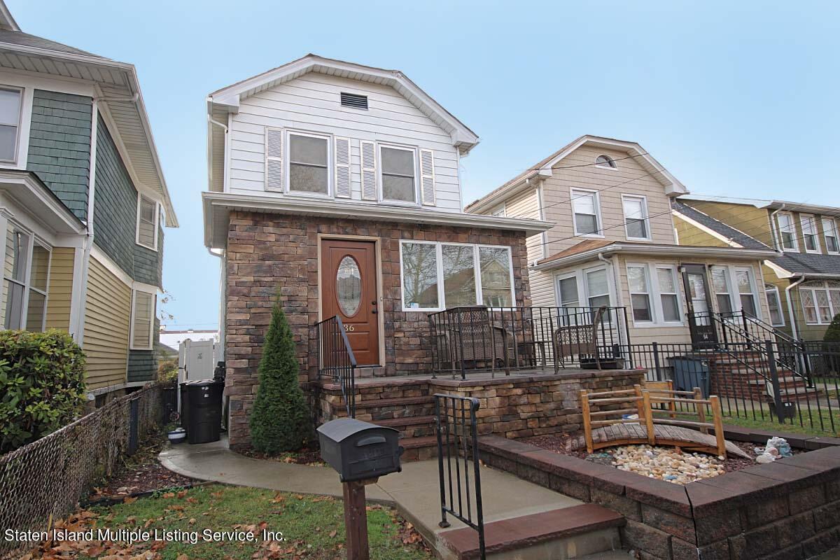 36 Cornell Street Staten Island, NY 10302 - Photo 30 of 31 a front view of a house with a yard