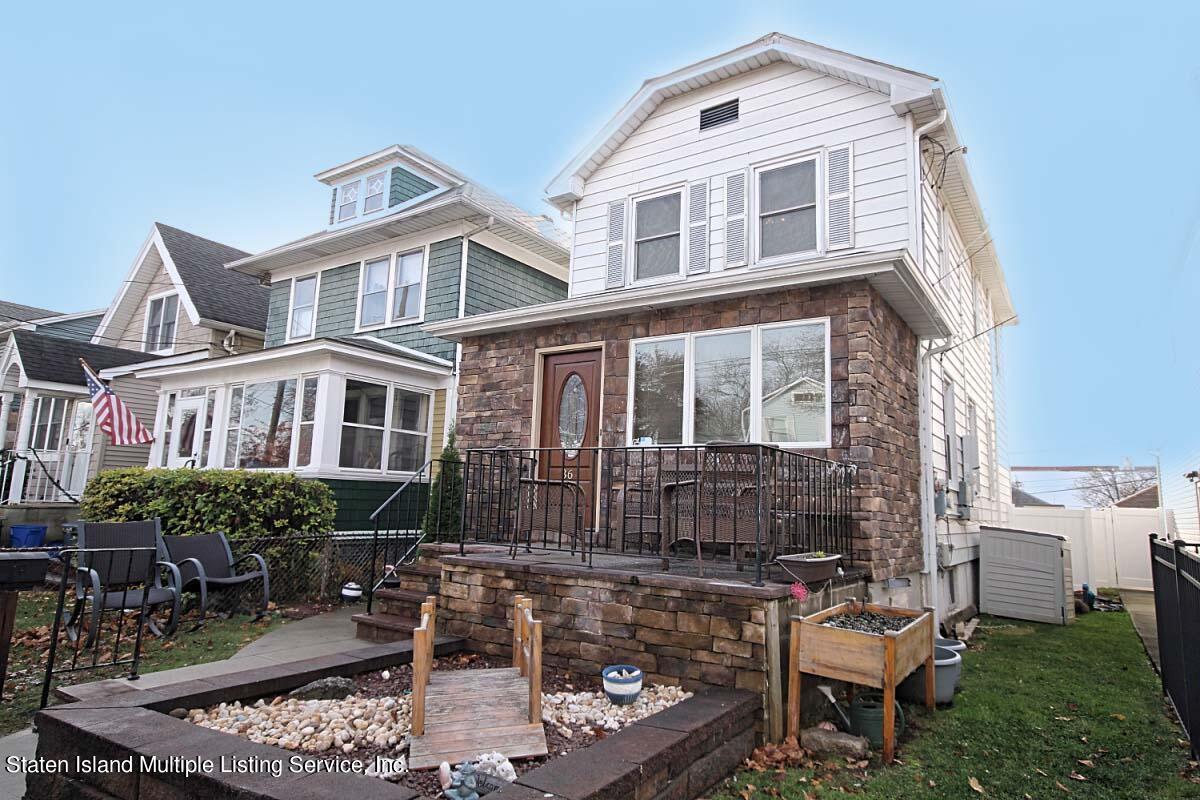 36 Cornell Street Staten Island, NY 10302 - Photo 31 of 31 a front view of a house with porch and garden