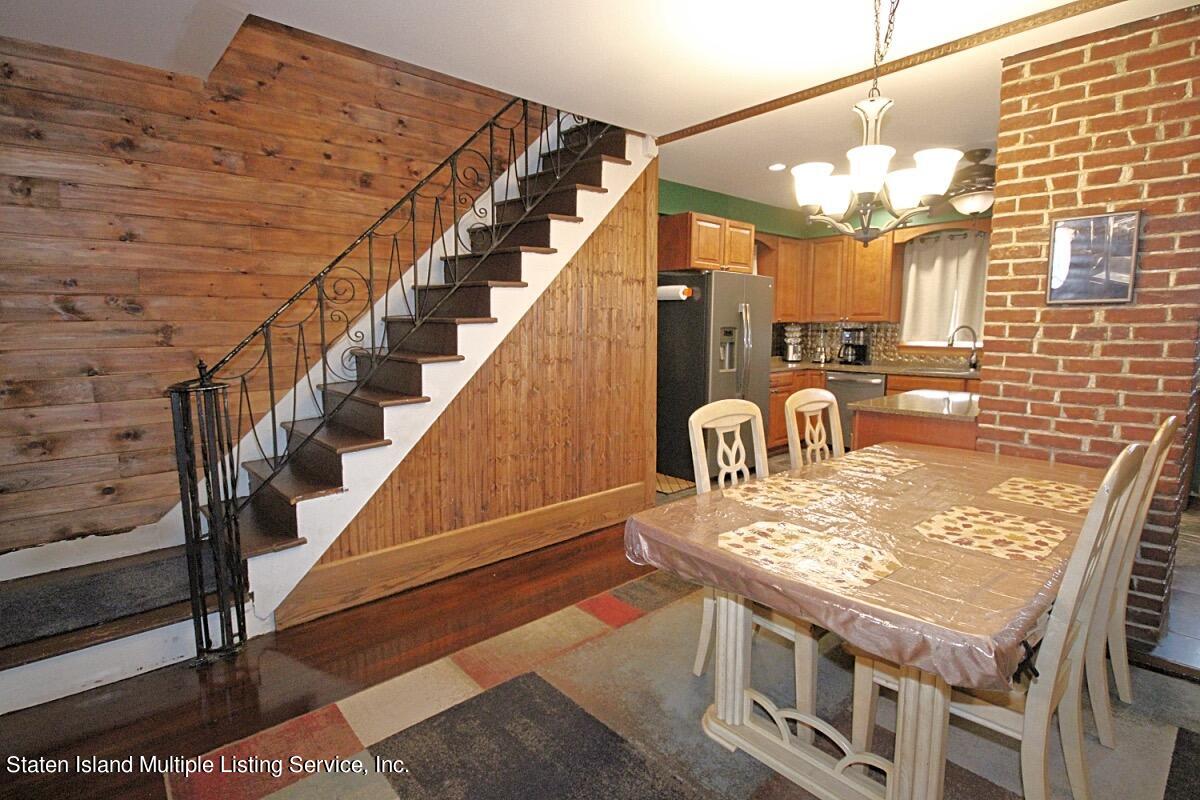 36 Cornell Street Staten Island, NY 10302 - Photo 8 of 31 a view of a balcony with table and chairs