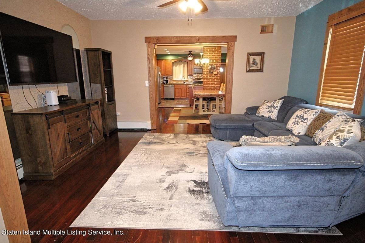 36 Cornell Street Staten Island, NY 10302 - Photo 10 of 31 a living room with furniture and a flat screen tv