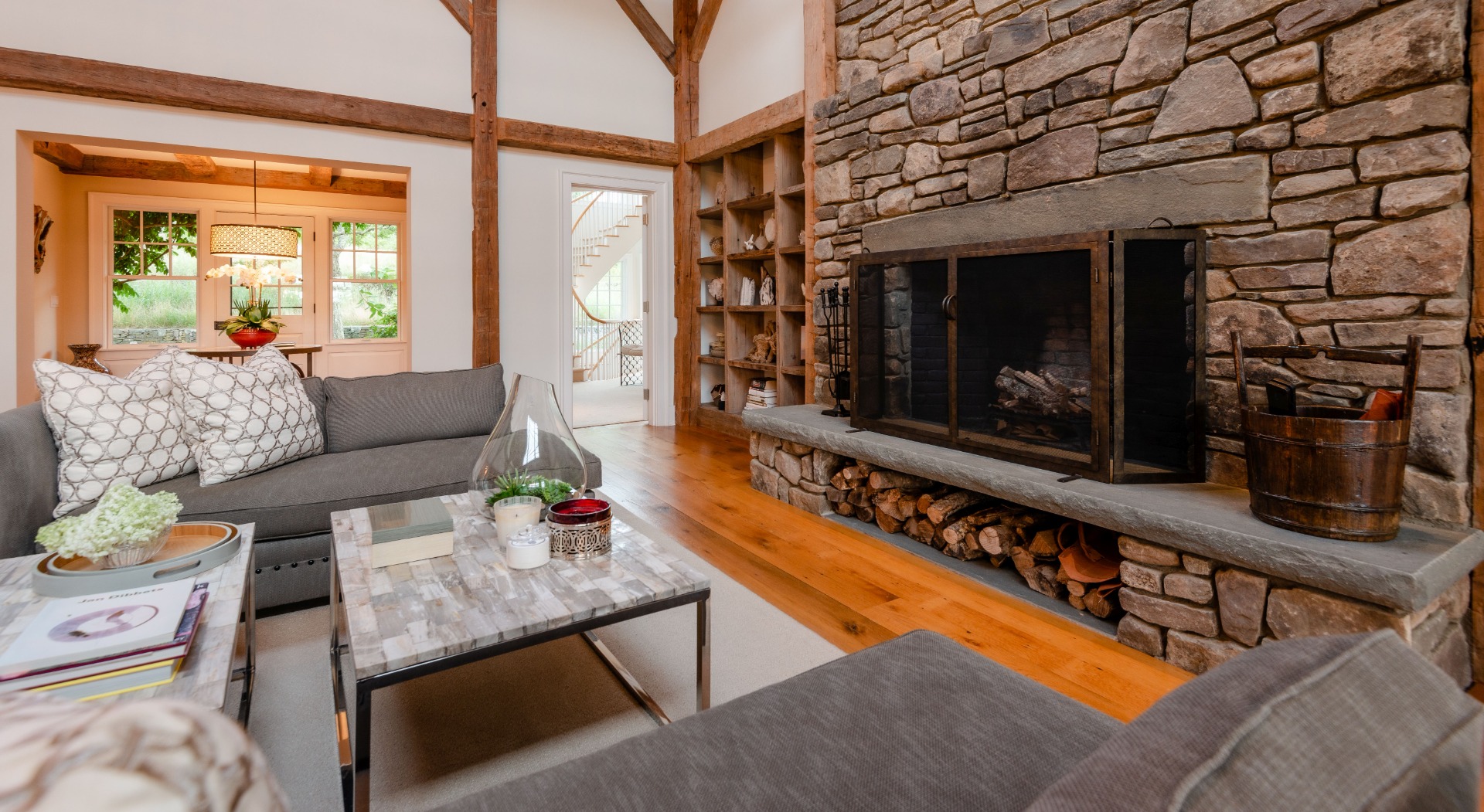 183 Polpis Road Nantucket, MA 02554 - Photo 14 of 62 a living room with furniture and a fireplace