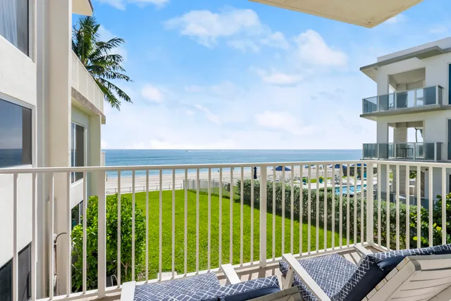 a view of a balcony with a garden