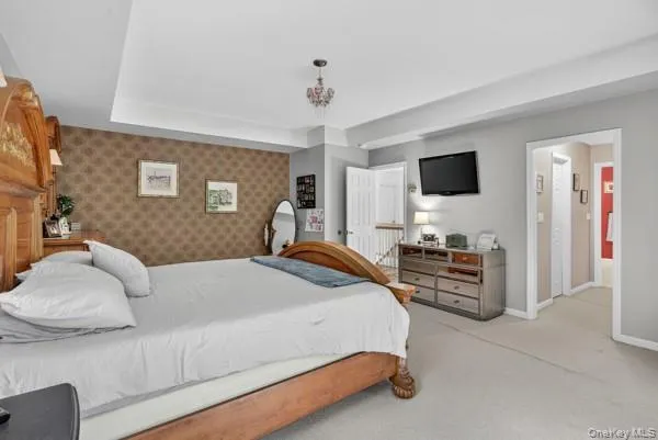 a bathroom with a sink a mirror and a shower