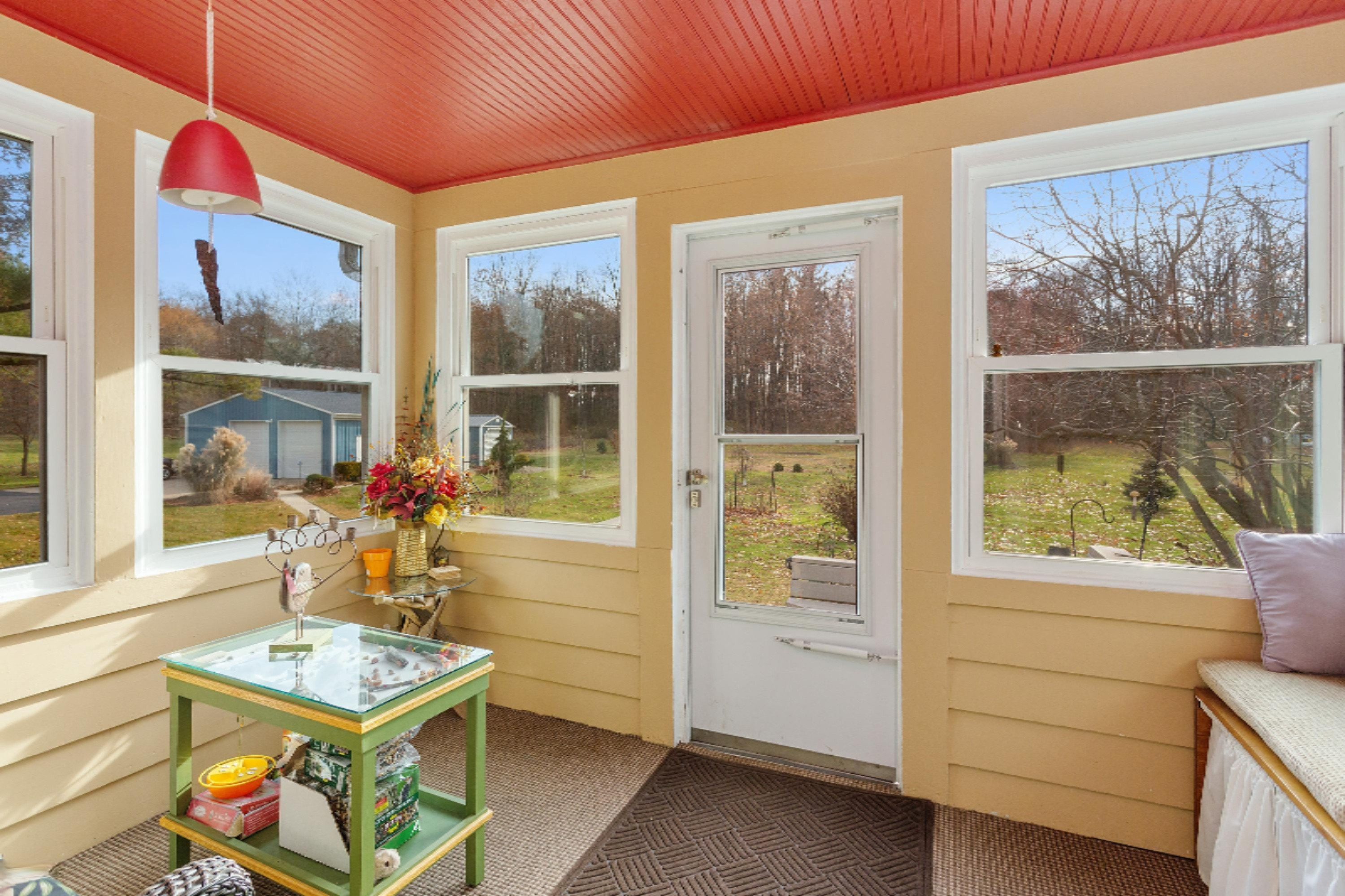8722 West East Road Lakeside, MI 49128 - Photo 13 of 23 06_8722EastRd_97_SunRoom_HiRes
