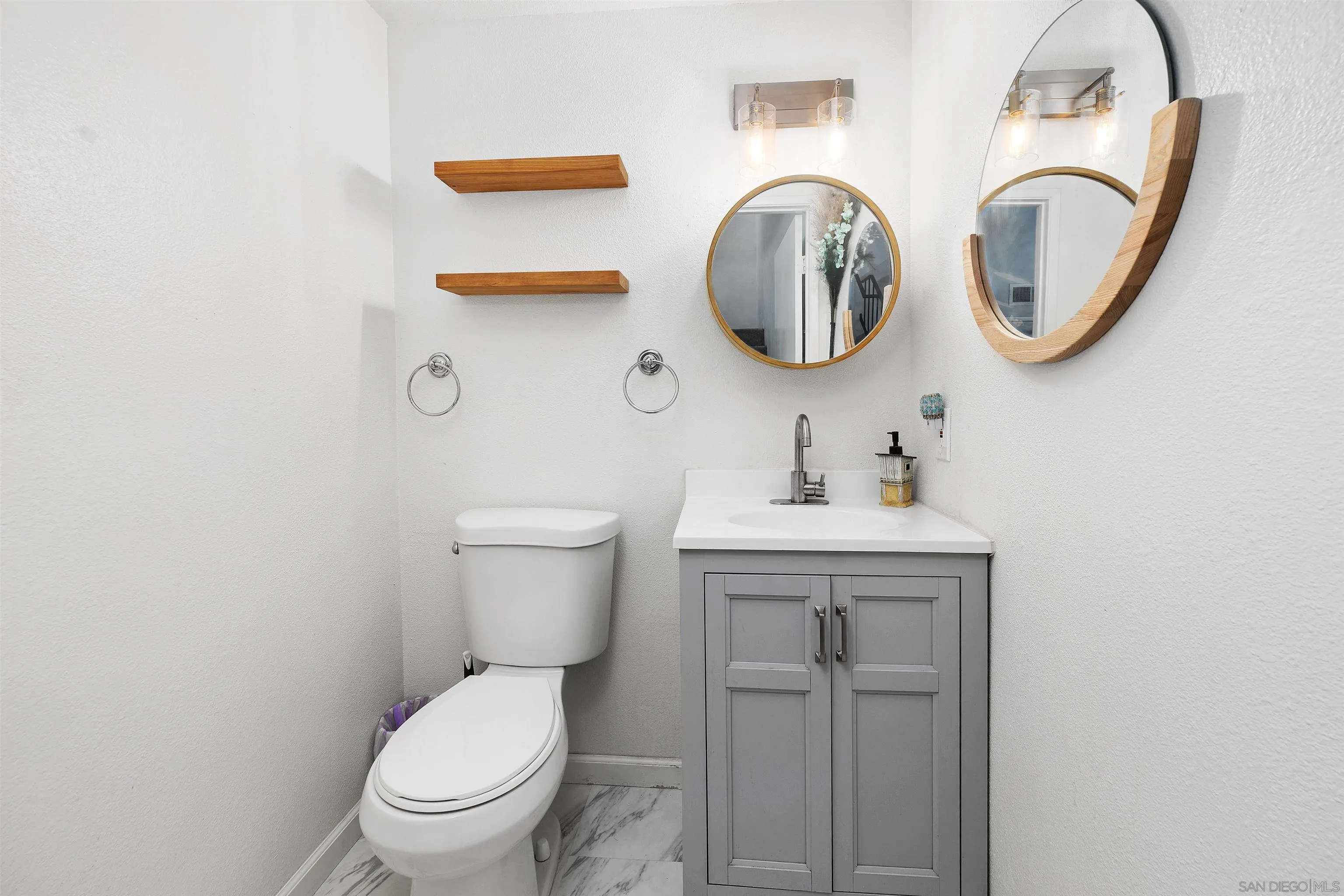 8325 Panorama Ridge Court Spring Valley, CA 91977 - Photo 22 of 39 a bathroom with a toilet and a sink