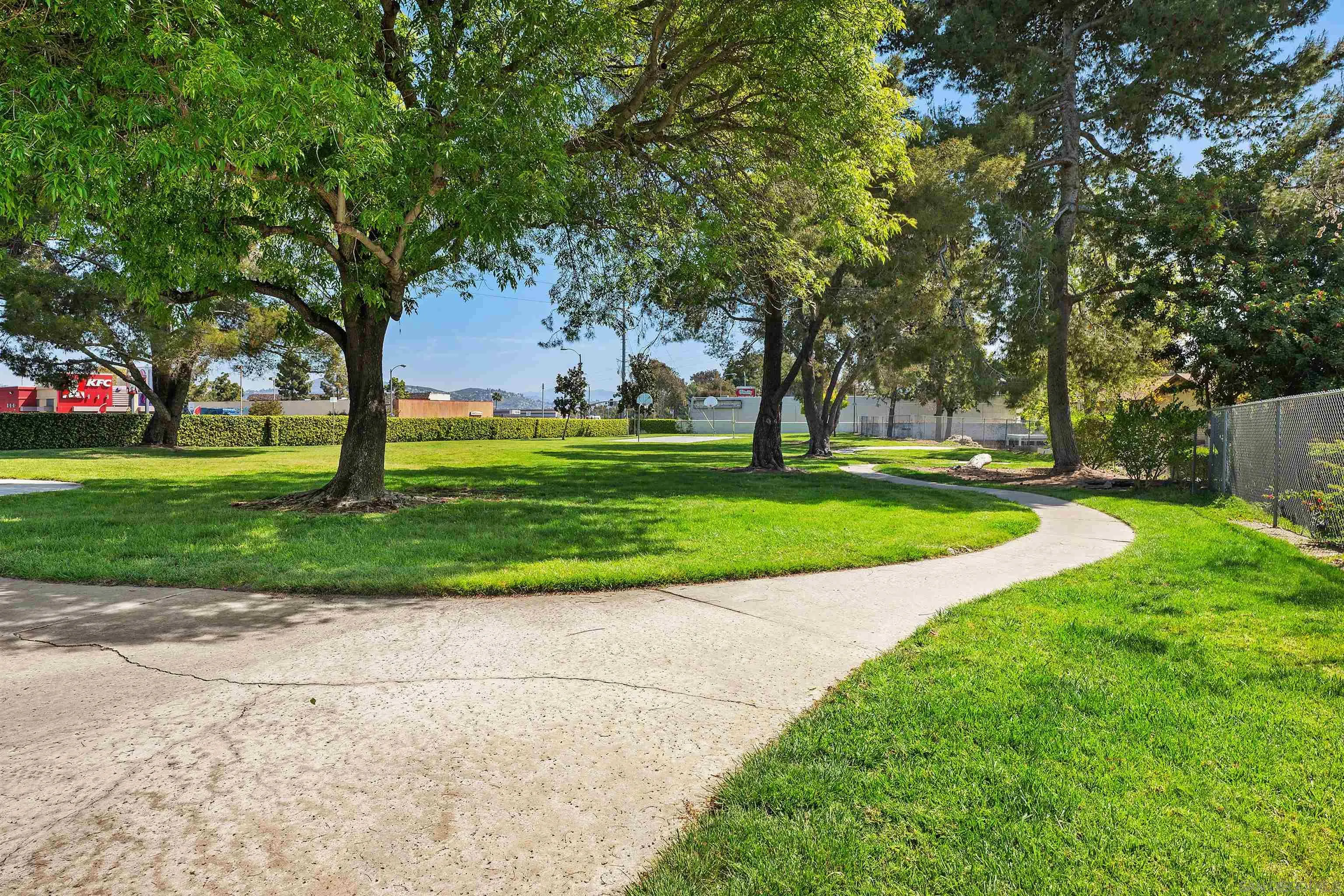 8325 Panorama Ridge Court Spring Valley, CA 91977 - Photo 36 of 39 a front view of a house with a yard