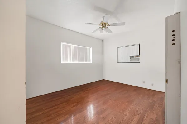 a view of an empty room with a window