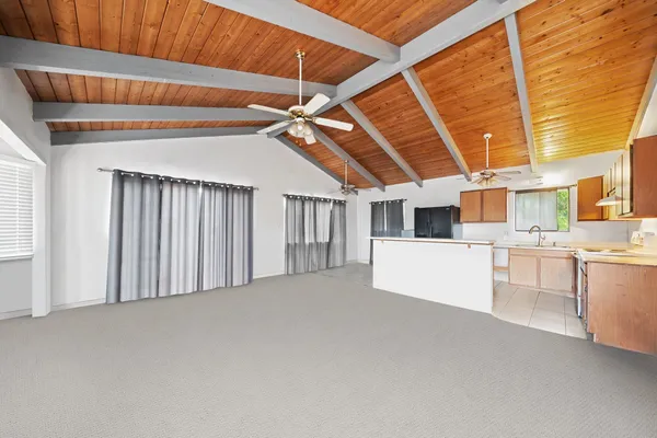 a view of a room with kitchen