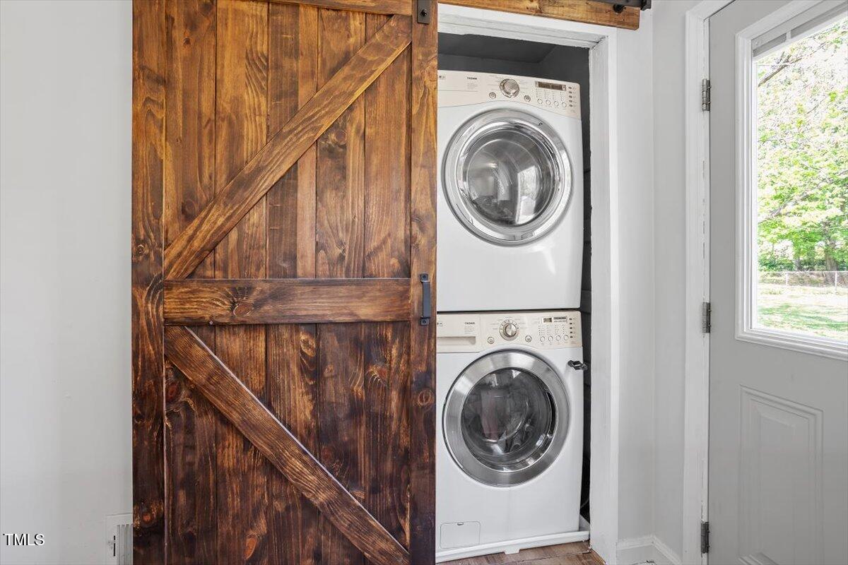 1017 Southerlund Road Garner, NC 27529 - Photo 3 of 26 a utility room with dryer and washer