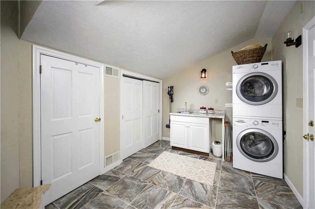 230 West Main Street Ligonier, PA 15658 - Photo 16 of 50 a view of a storage & utility room with dryer and washer