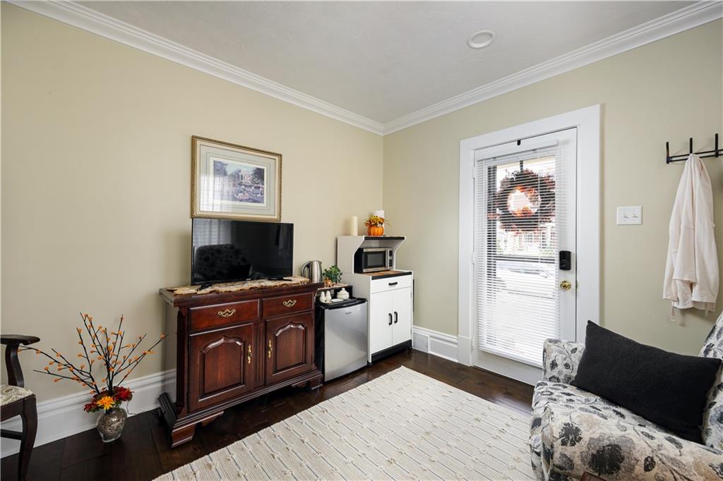 230 West Main Street Ligonier, PA 15658 - Photo 20 of 50 a living room with furniture and a flat screen tv