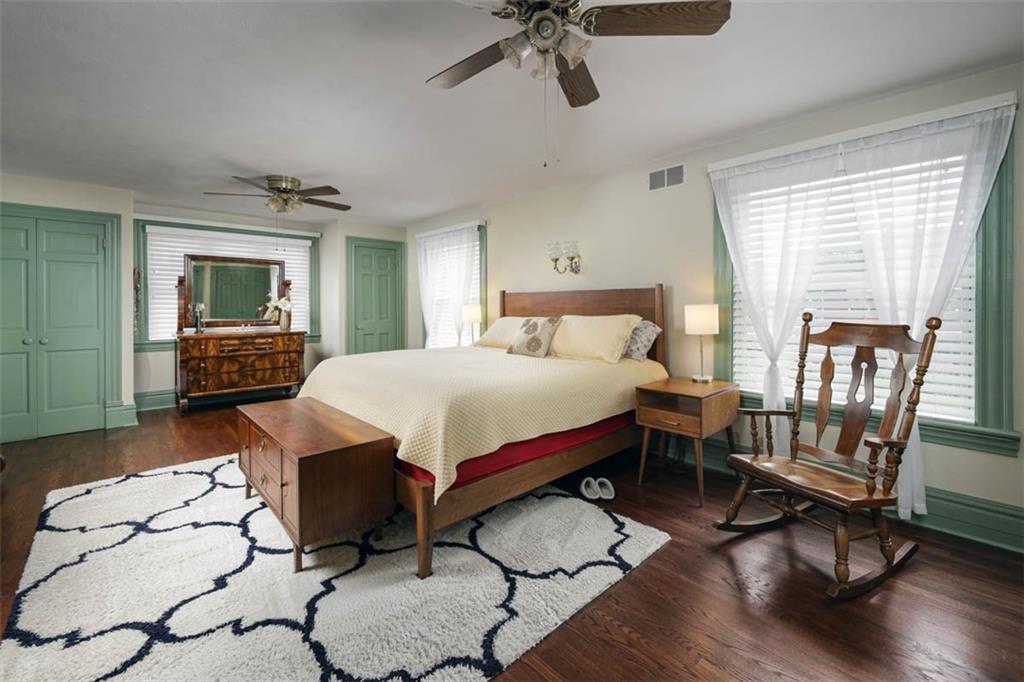 230 West Main Street Ligonier, PA 15658 - Photo 23 of 50 a bedroom with a bed and wooden floor