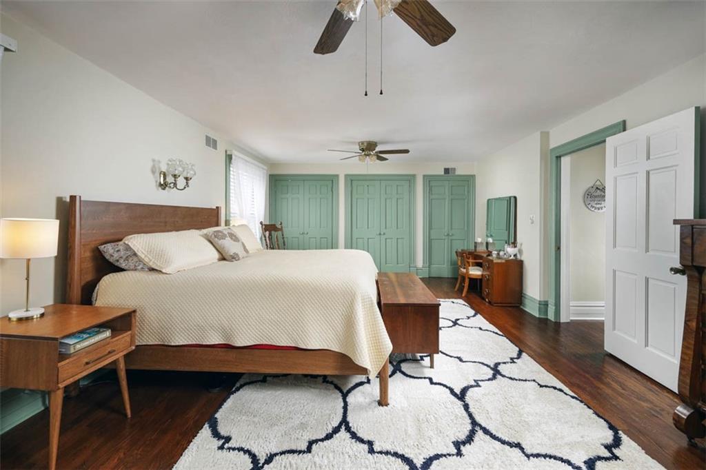 230 West Main Street Ligonier, PA 15658 - Photo 24 of 50 a bedroom with a bed a desk and chair