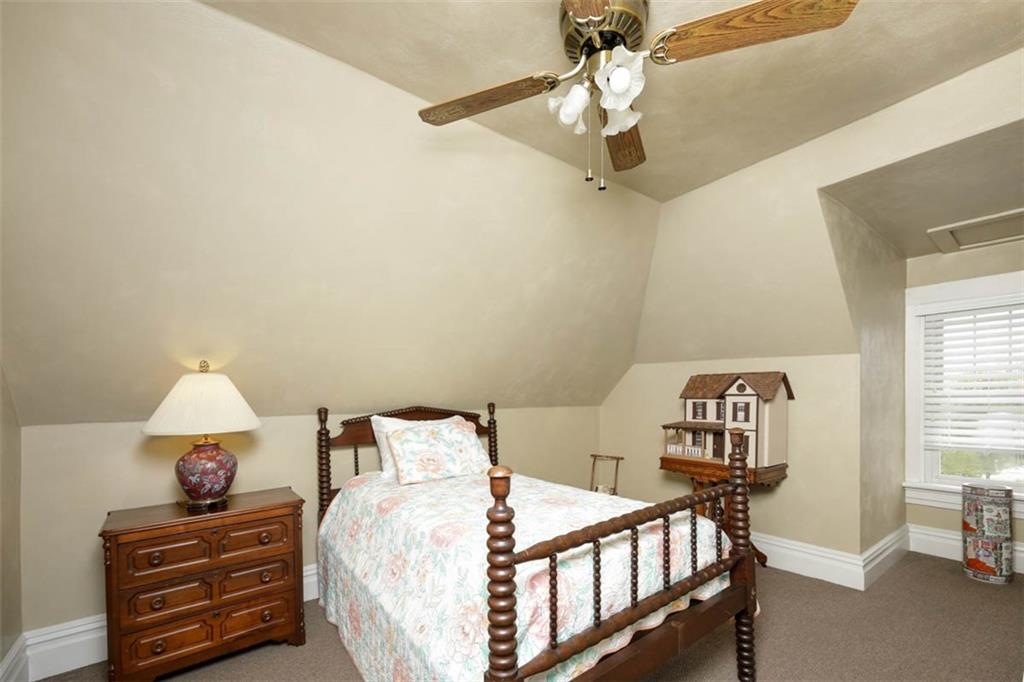 230 West Main Street Ligonier, PA 15658 - Photo 32 of 50 a bedroom with furniture and a chandelier