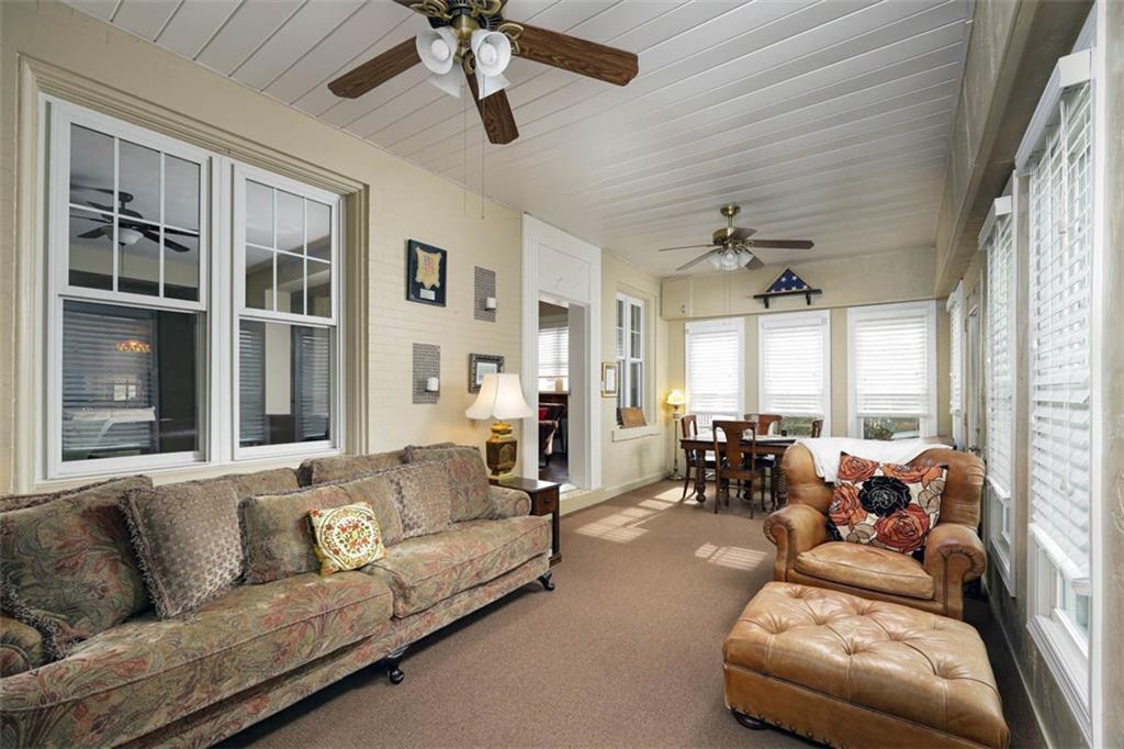 230 West Main Street Ligonier, PA 15658 - Photo 4 of 50 a living room with furniture and a large window