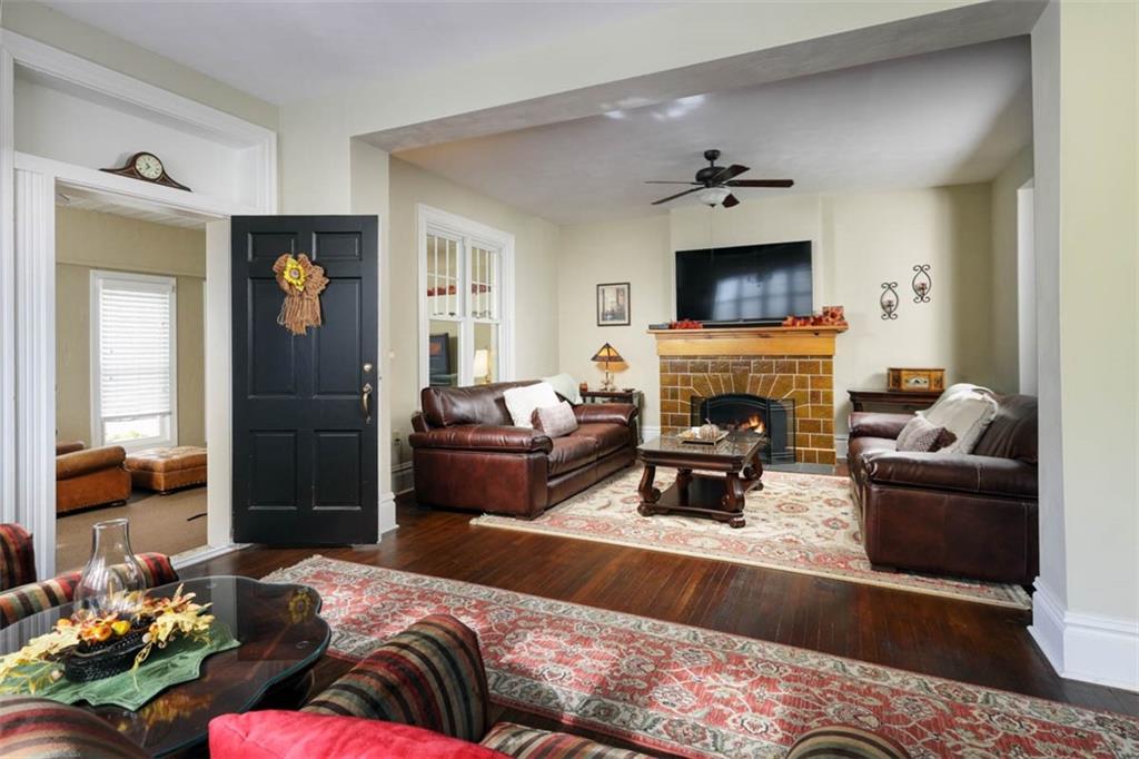 230 West Main Street Ligonier, PA 15658 - Photo 6 of 50 a living room with furniture and a fireplace