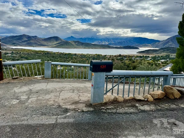 a view of a garden with a deck