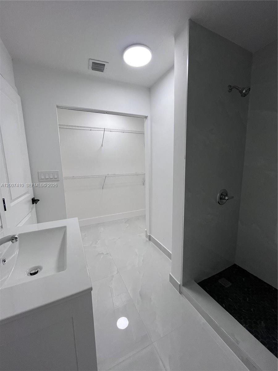 10058 Southwest 156th Court Miami, FL 33196 - Photo 6 of 13 wooden floor in an empty room