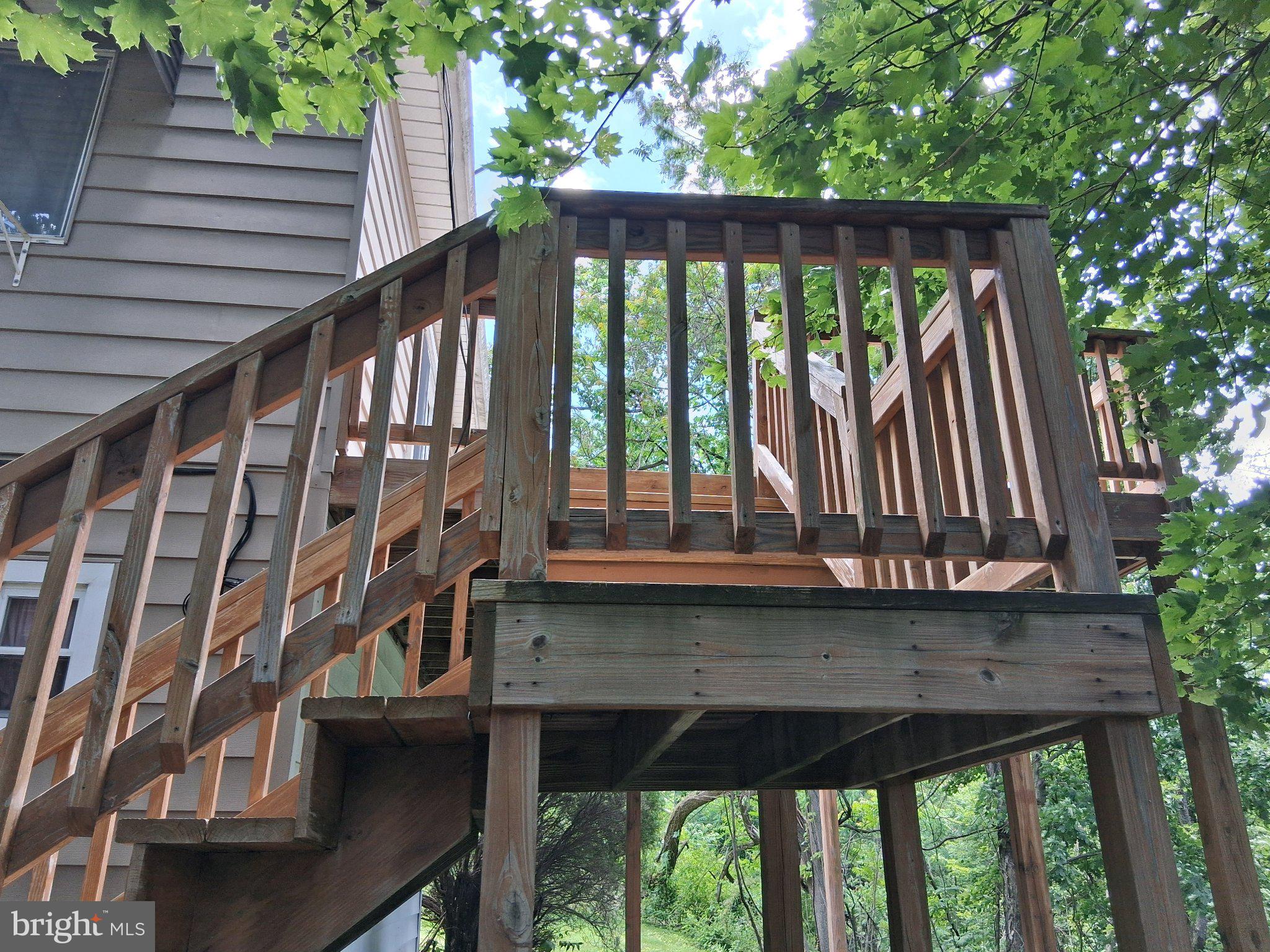 265 View Street Johnstown, PA 15902 - Photo 12 of 66 Charming wooden deck in nature's embrace.