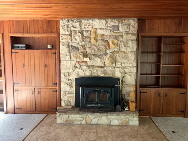 a living room with a fireplace