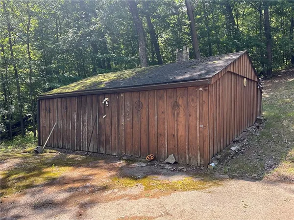 a view of a tree in a yard