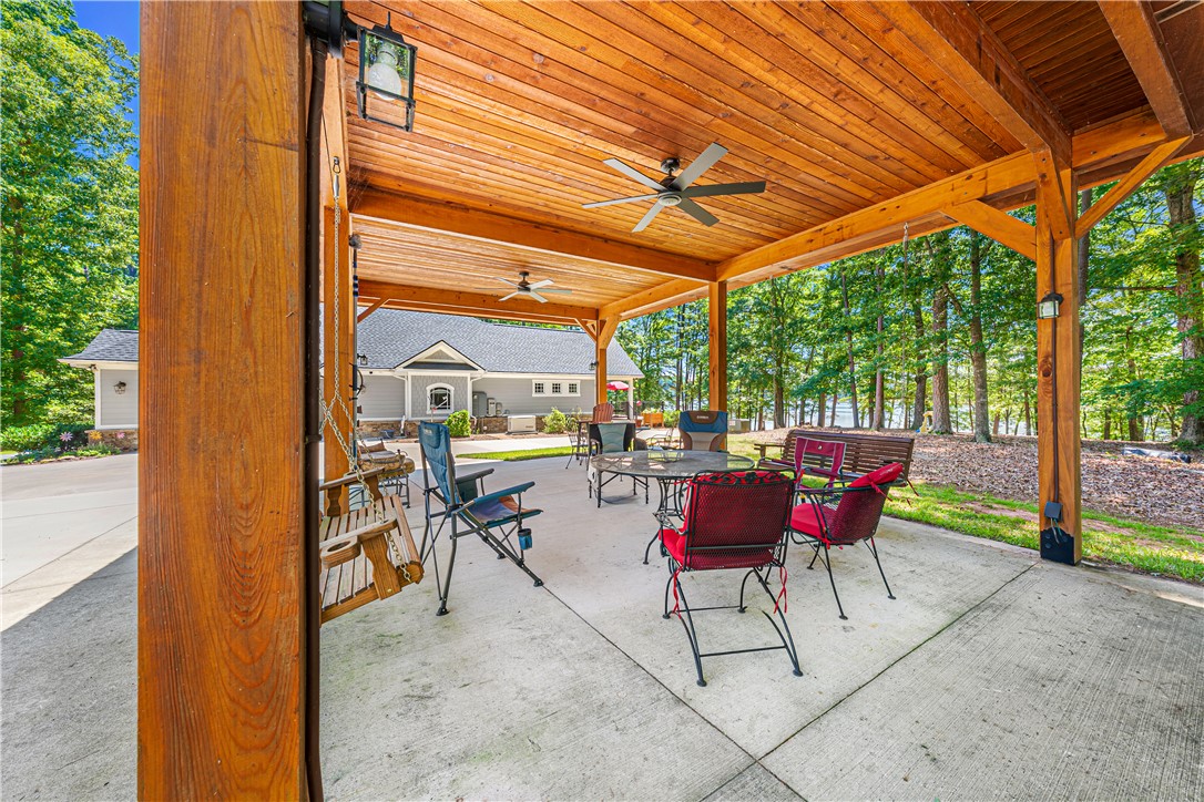 285 Bertha Allen Road Westminster, SC 29693 - Photo 32 of 50 A spacious covered patio offers a refreshing outdoor retreat, ideal for lakeside gatherings.