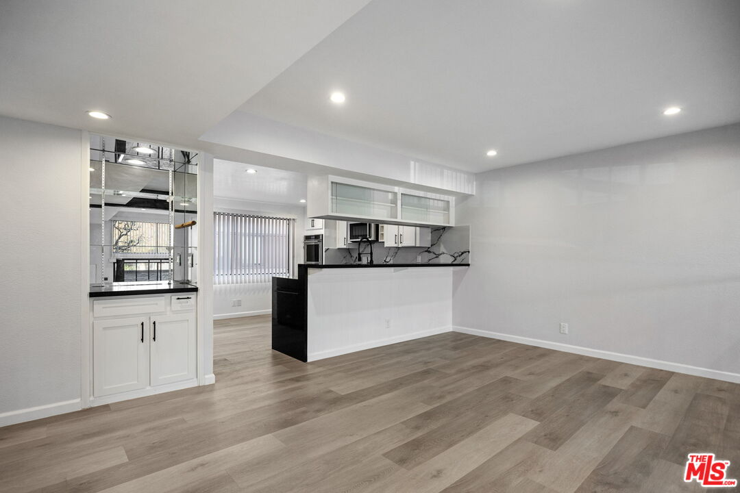 4631 Alla Road, Unit 8 Marina del Rey, CA 90292 - Photo 12 of 29 a view of kitchen with wooden floor