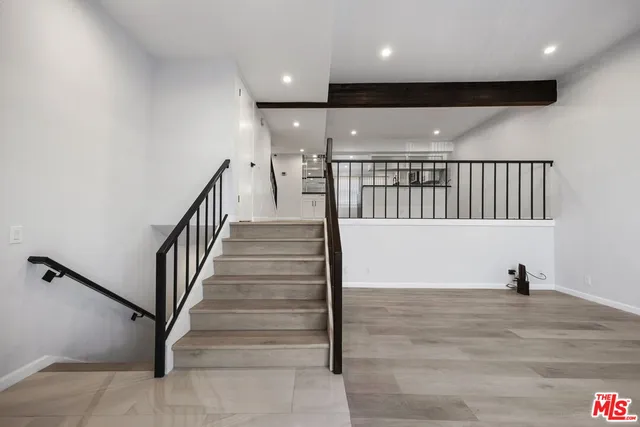 a view of a hallway with entryway