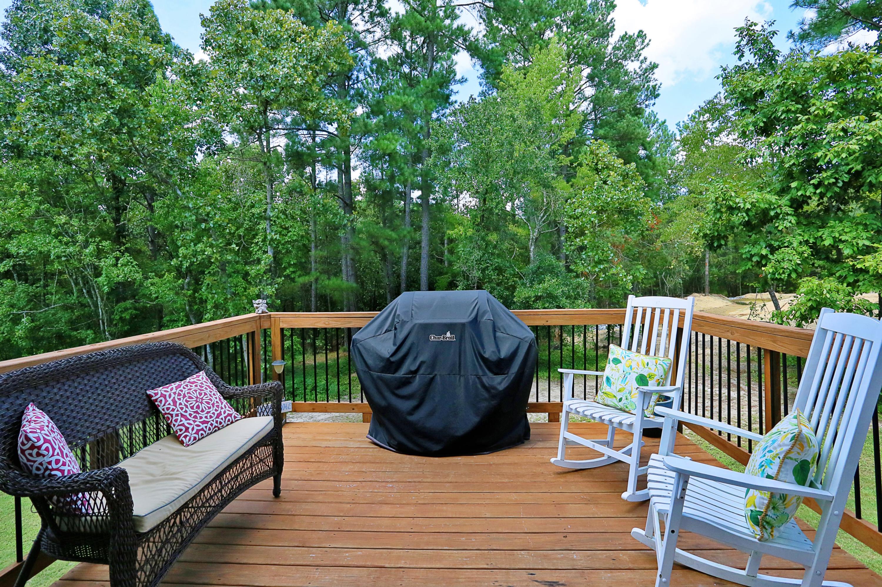 198 Sandy Springs Road Aberdeen, NC 28315 - Photo 12 of 27 Deck with backyard view