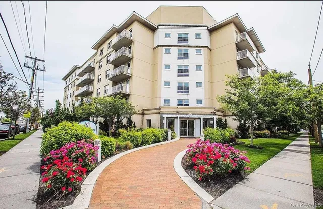 a view of a building and a garden