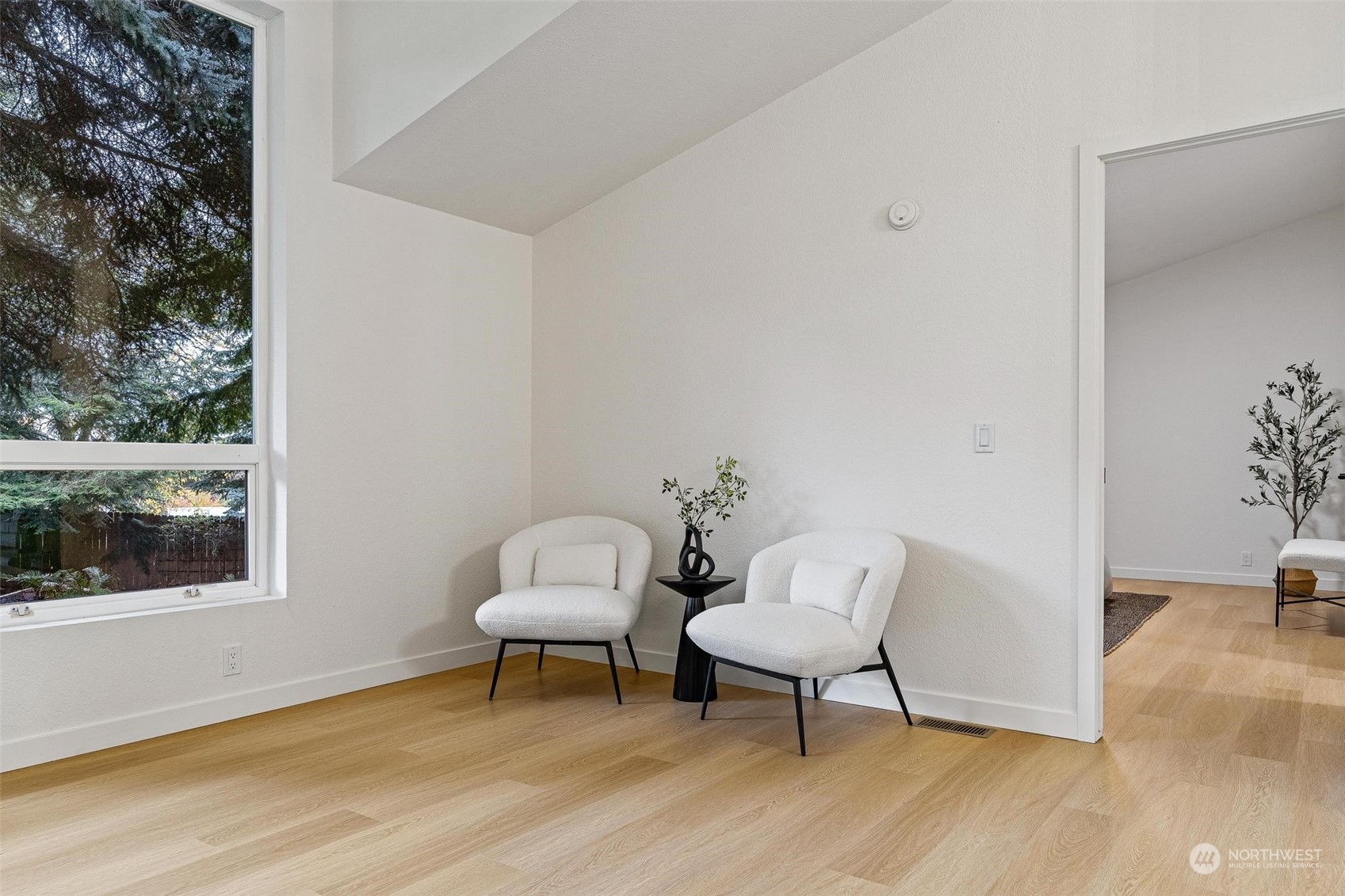 9601 South 198th Place Renton, WA 98055 - Photo 11 of 38 a living room with furniture and a window