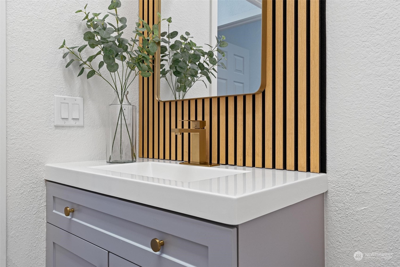 9601 South 198th Place Renton, WA 98055 - Photo 27 of 38 a bathroom with a sink and a mirror