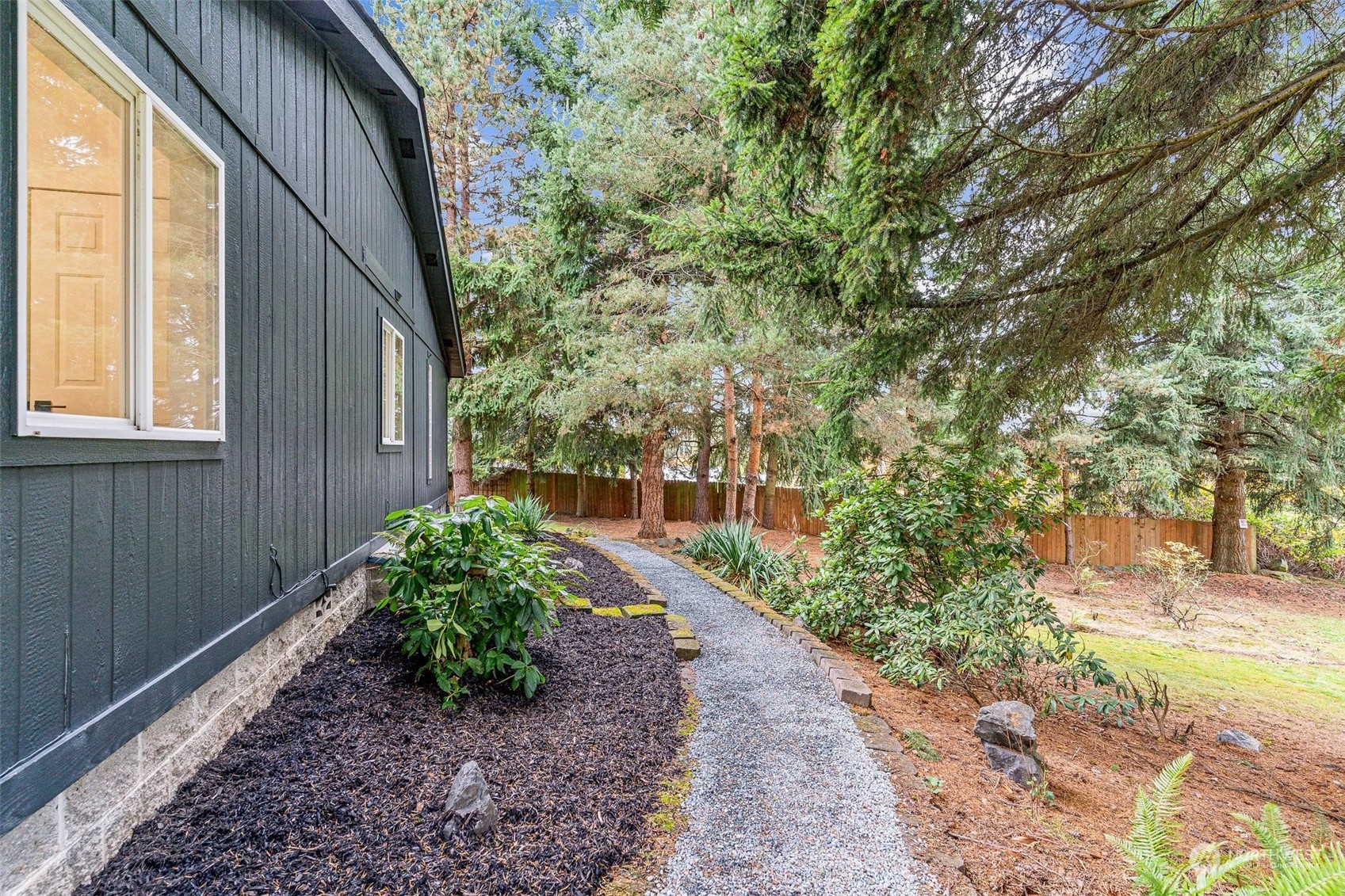 9601 South 198th Place Renton, WA 98055 - Photo 33 of 38 a view of a backyard with pathway
