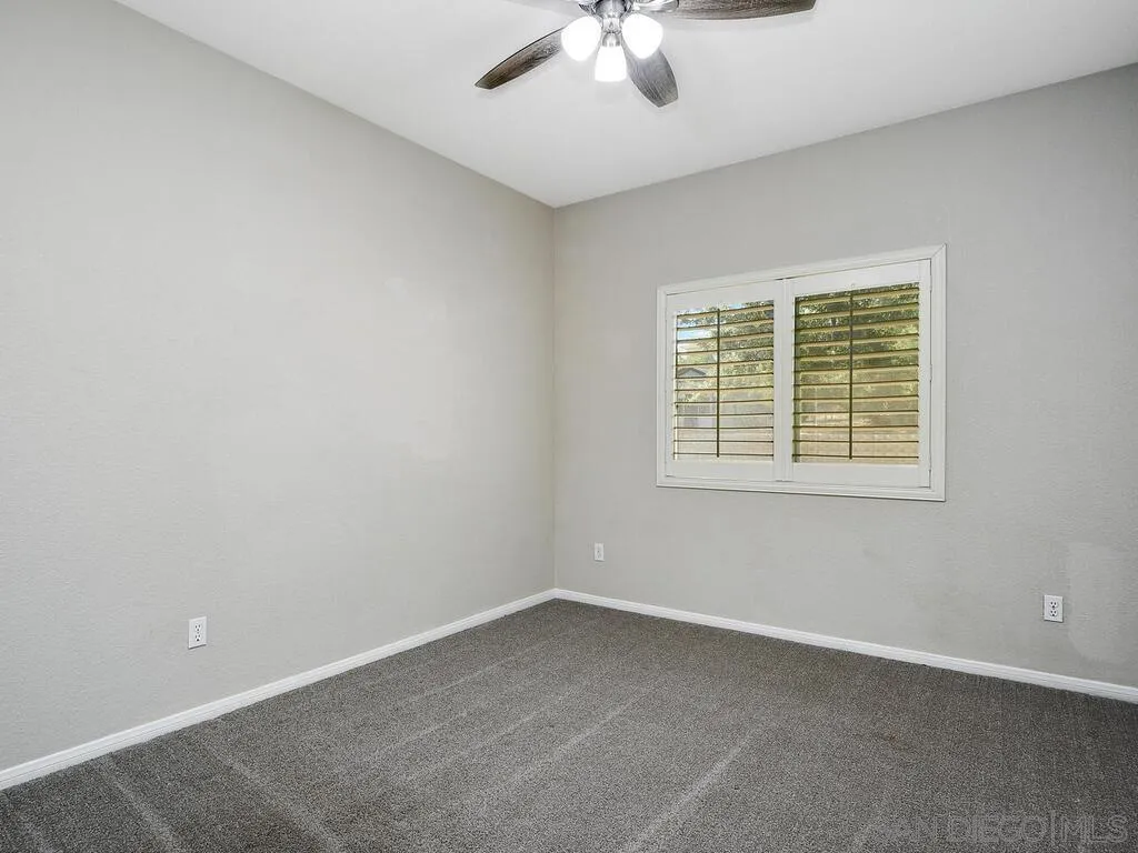 16304 Dartolo Road Ramona, CA 92065 - Photo 21 of 36 an empty room with a window