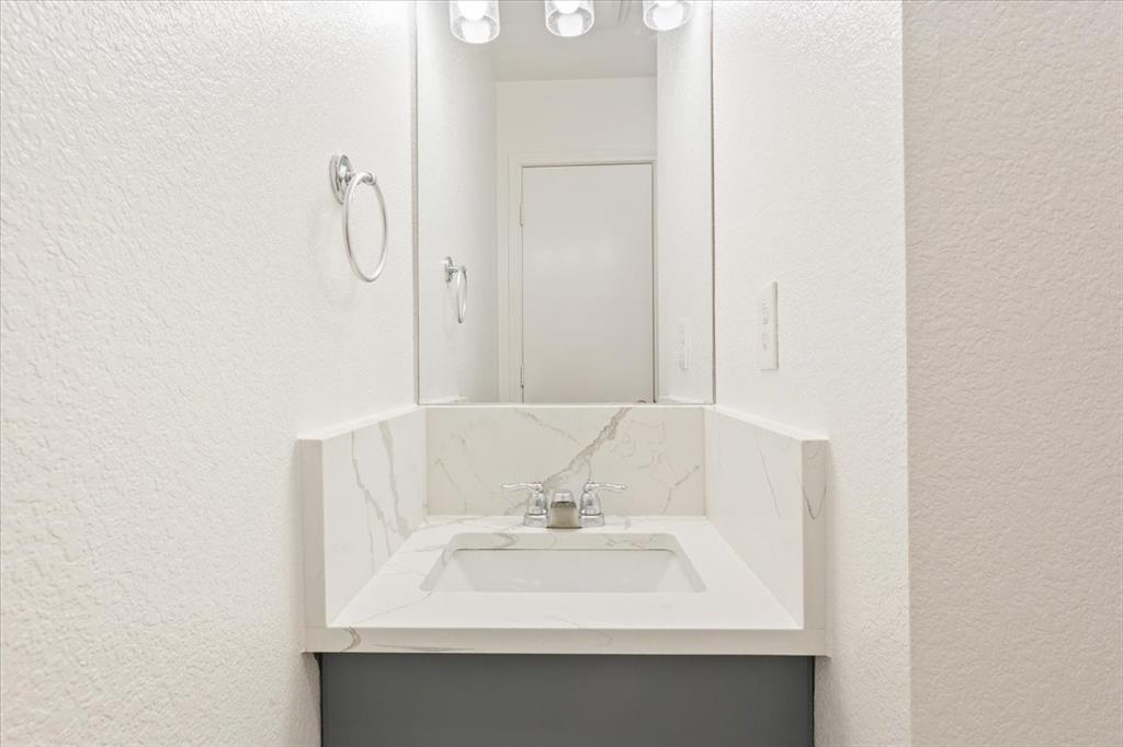 1120 Holt Avenue Waco, TX 76706 - Photo 19 of 25 a bathroom with a sink and a mirror