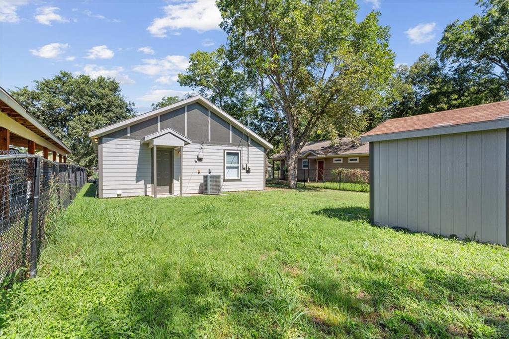 1120 Holt Avenue Waco, TX 76706 - Photo 22 of 25 a front view of a house with yard and green space