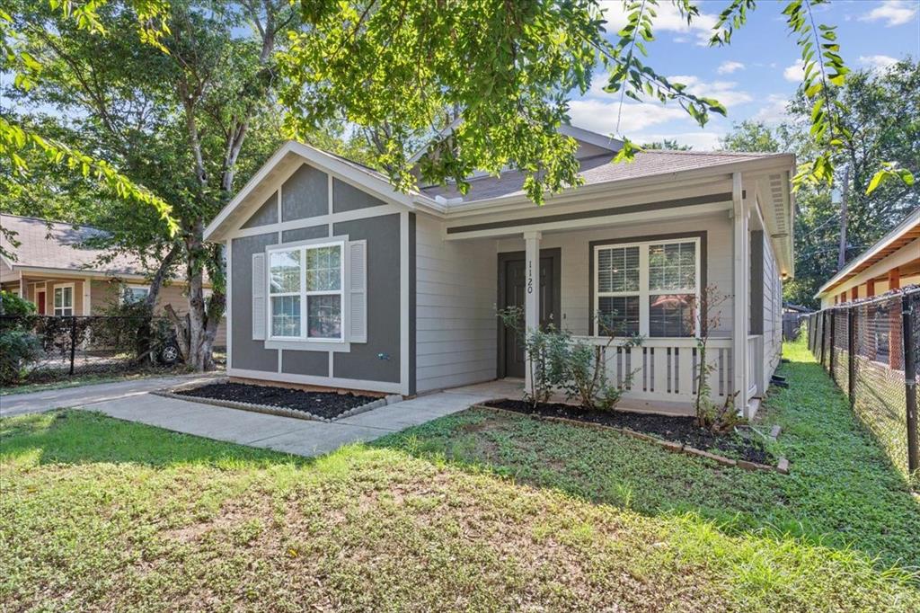 1120 Holt Avenue Waco, TX 76706 - Photo 3 of 25 a front view of a house with a yard