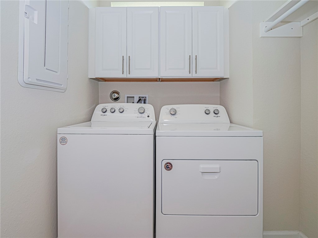 5190 Unity Square Vero Beach, FL 32967 - Photo 24 of 31 a view of storage and utility room with washer and dryer