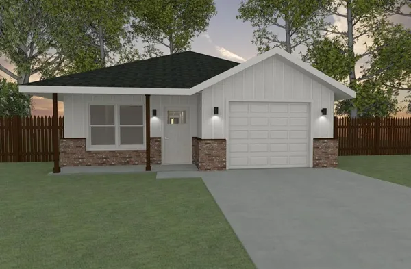 a view of a house with a yard and garage