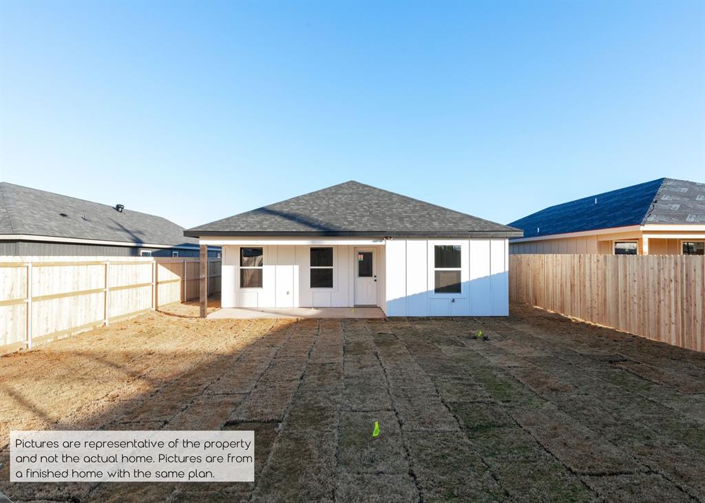 251 Tombstone Road Abilene, TX 79602 - Photo 25 of 27 a view of a house with a yard