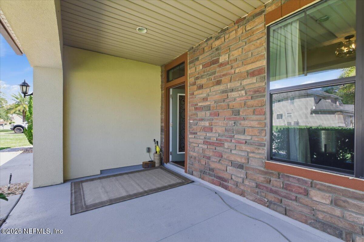 788 Reflection Cove Road East Jacksonville, FL 32218 - Photo 3 of 27 a view of front door of house