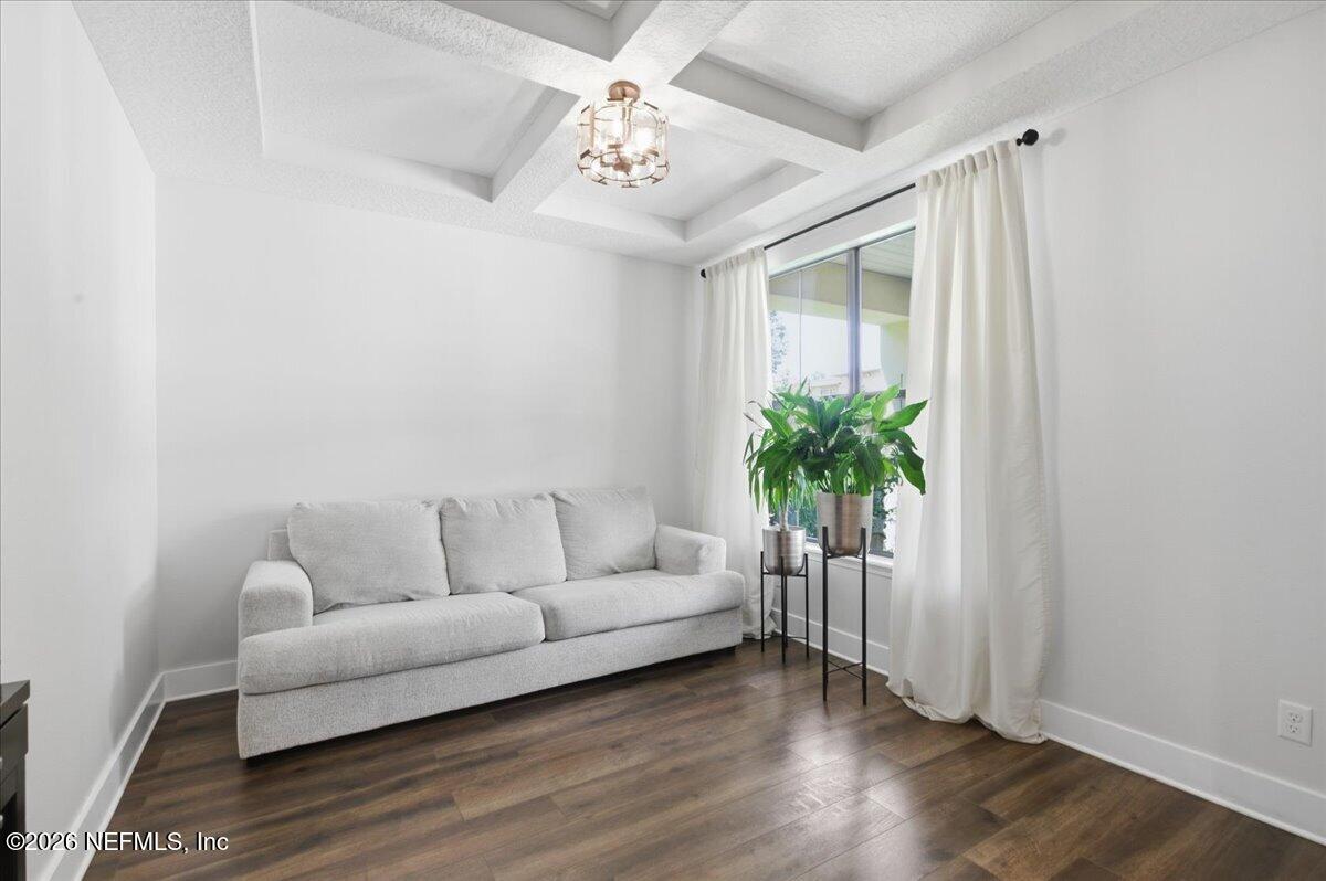 788 Reflection Cove Road East Jacksonville, FL 32218 - Photo 5 of 27 a living room with furniture and a potted plant