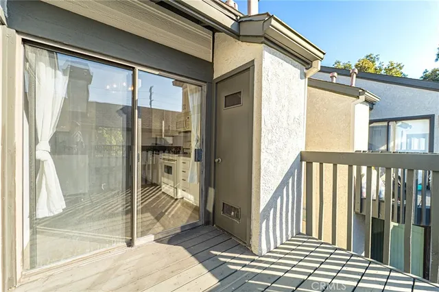 a bathroom with a glass door and glass door