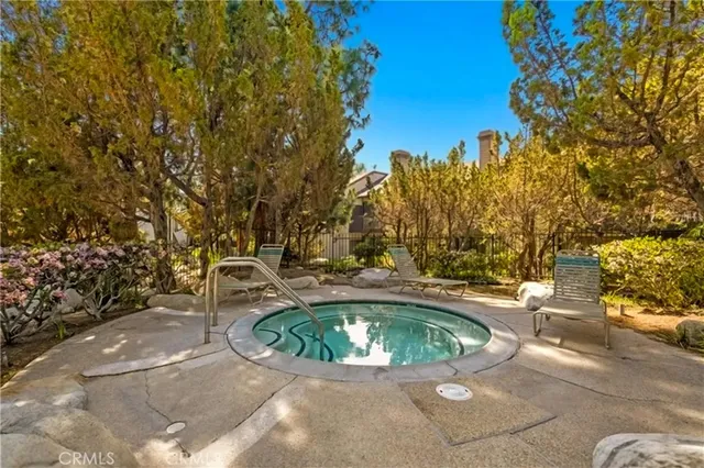 a view of swimming pool with a yard