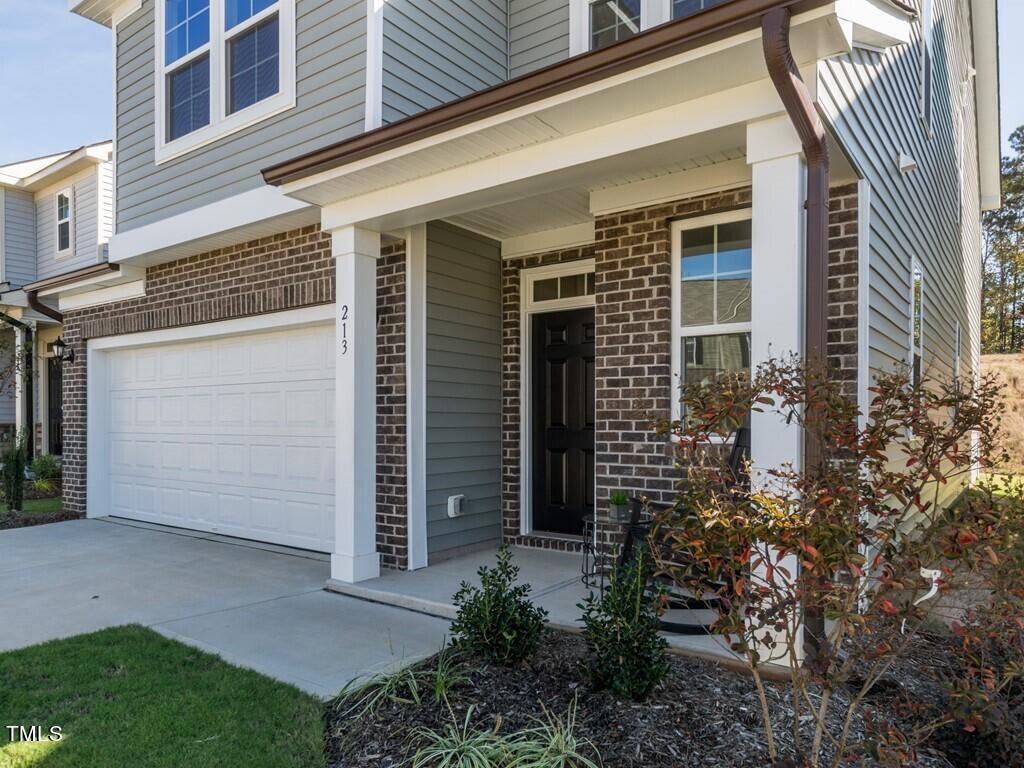 20 Muskogee Road Angier, NC 27501 - Photo 3 of 21 002_ Covered Front Porch