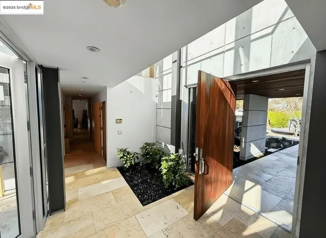 a kitchen with stainless steel appliances a refrigerator and stove